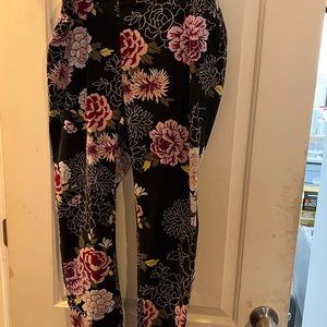 Black flowered long pants. Stretch waist size 16 made by Terra and Sky